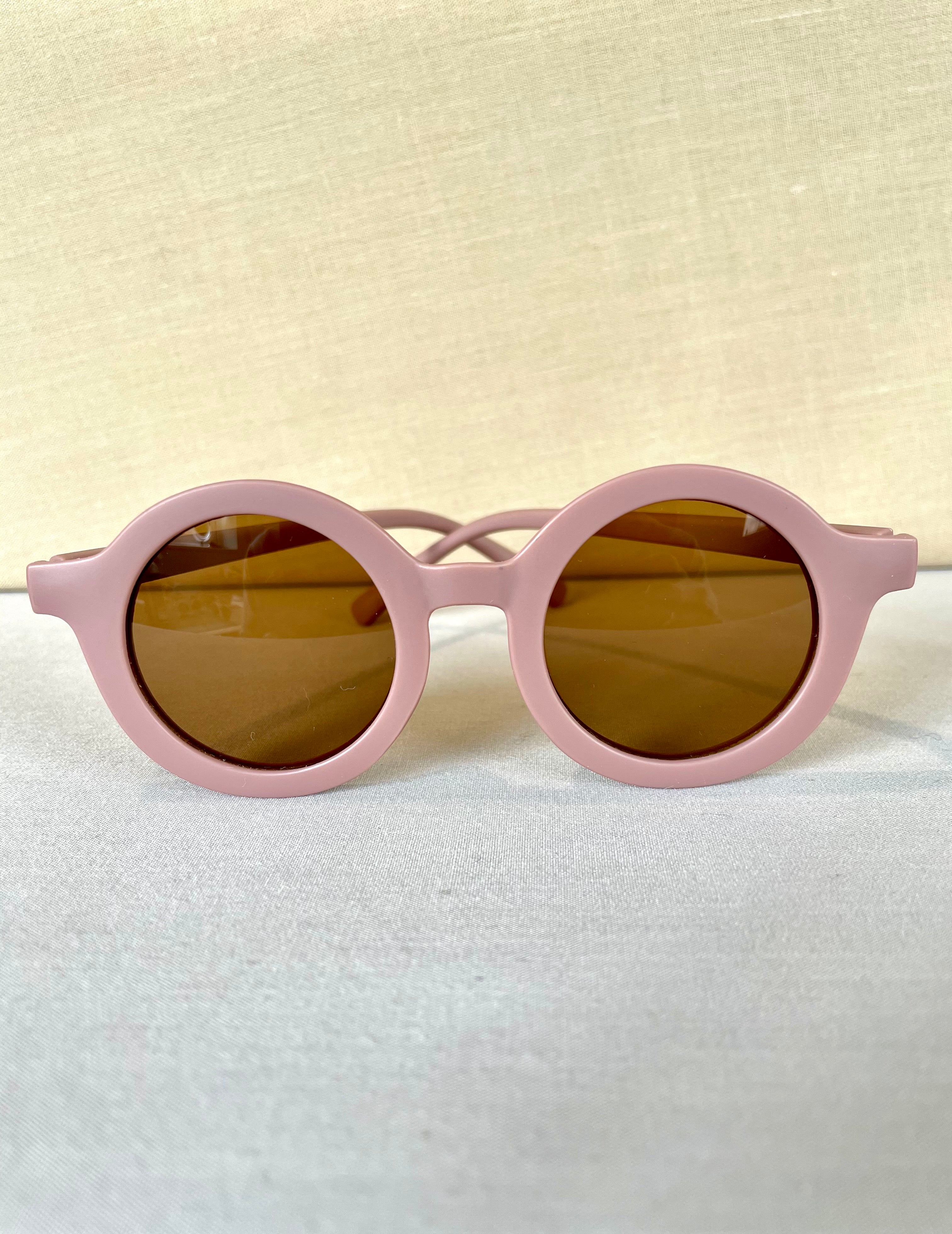 Old pink children's sunglasses